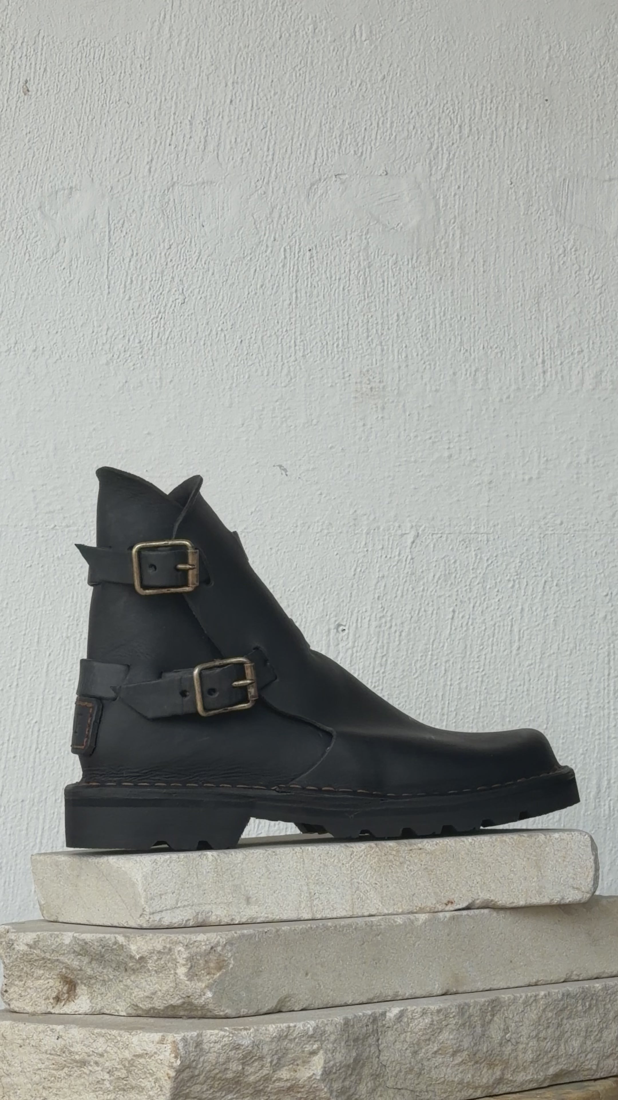 black boot brass vid